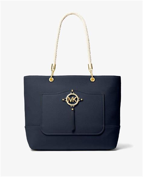 8 bolsos de Michael Kors que ya están rebajados en El Corte .